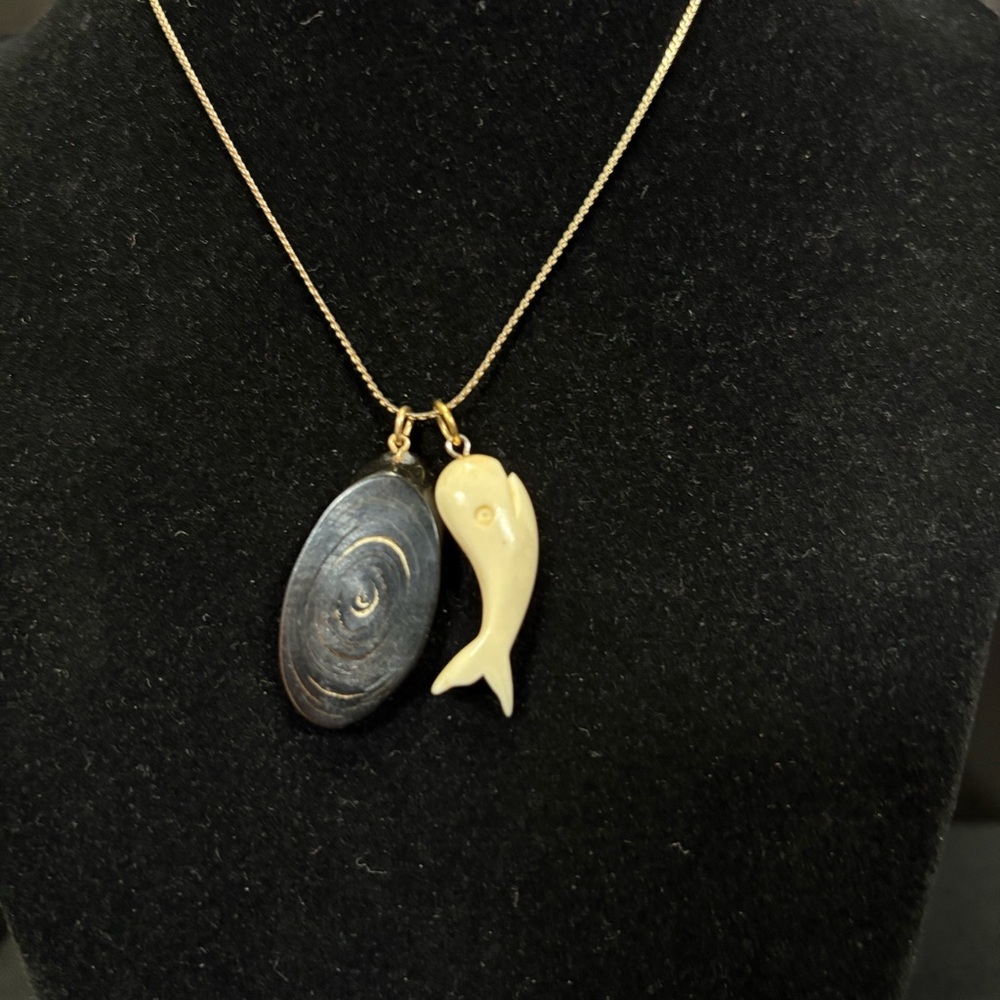 Carved Ivory Wale & Black Coral Slice